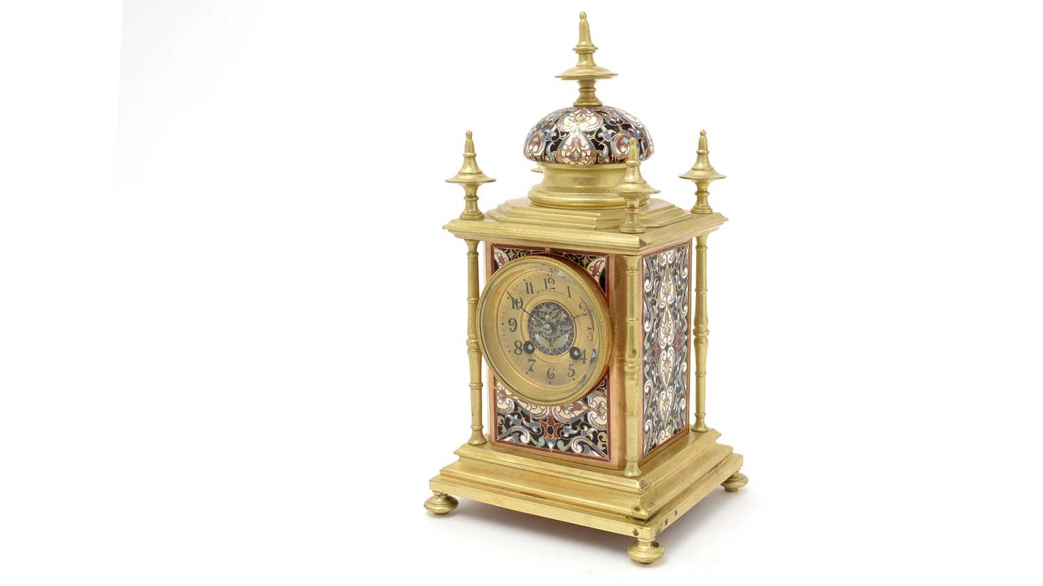 Vincenti et Cie: a French 19th Century gilt brass and champleve mantel clock.