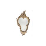 A 19th Century giltwood rococo-style wall mirror.