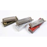 Three Chromatic Harmonicas