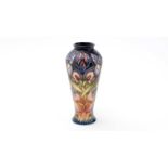 A Limited Edition Moorcroft Geneva (Gentian) pattern vase, designed by Philip Gibson