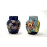 Two Moorcroft ginger jars and covers