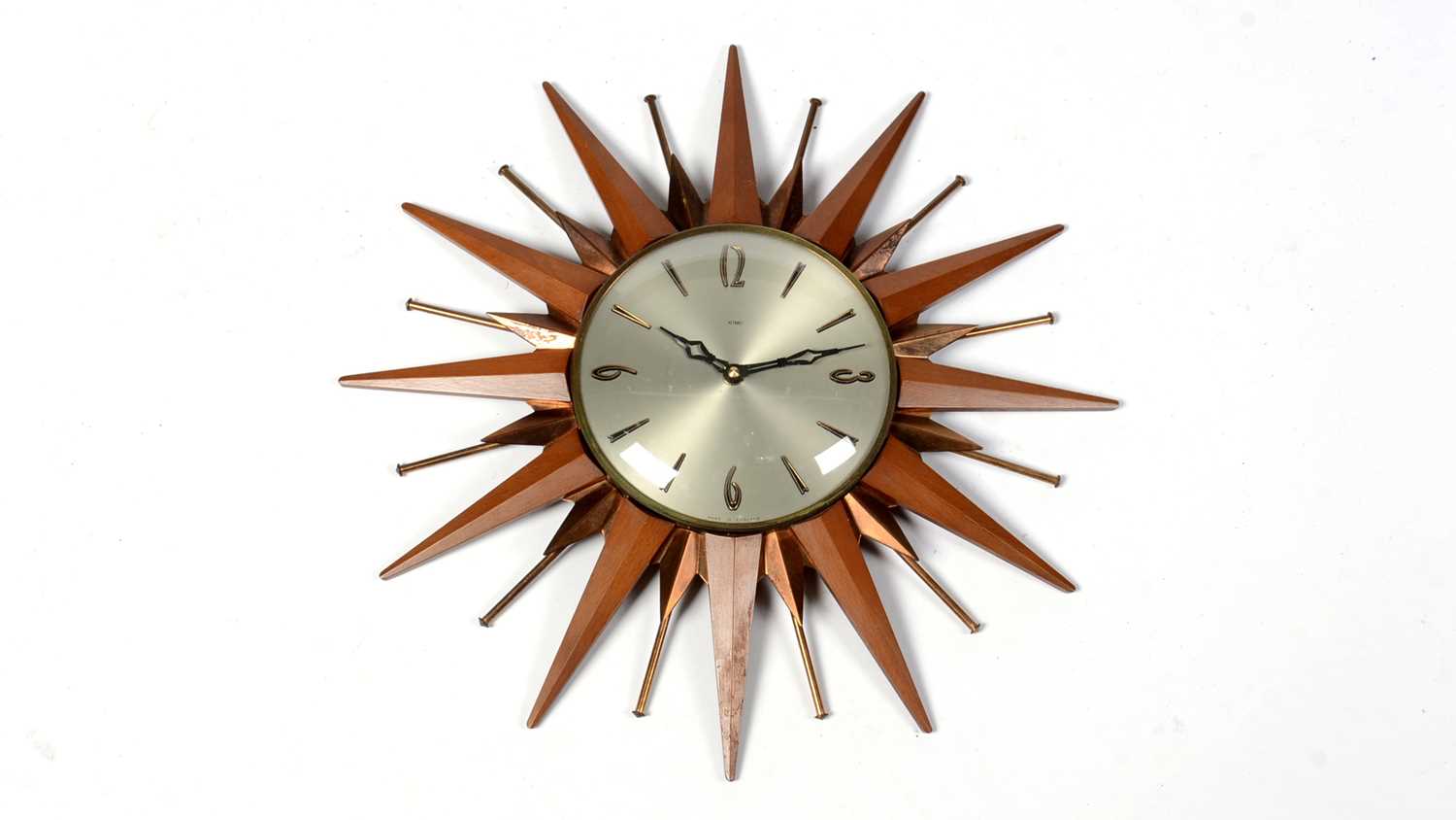 A retro vintage mid 20th Century circa 1960s Metamec sunburst / Atomic wall clock