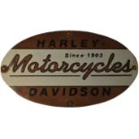 ﻿An enamel advertising sign,﻿ Harley Davidson Motorcycles,