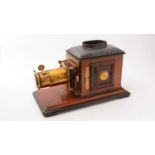 An early 20th Century mahogany and brass Magic Lantern,