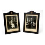A pair of signed photographic portraits of Queen Elizabeth II and Prince Philip