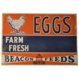 ﻿An enamel advertising sign, ﻿Beacon Feeds, Eggs Farm Fresh,