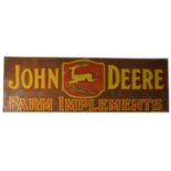 ﻿An enamel advertising sign,﻿ John Deere,