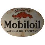 An enamel advertising sign, Gargoyle Mobiloil Vacuum Oil Company,