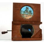 A collection of six Victorian mahogany springed mechanical lantern slide