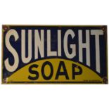 ﻿An enamel advertising sign, ﻿Sunlight Soap,