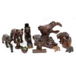 A collection of German Black Forrest carved bears and a deer trophy