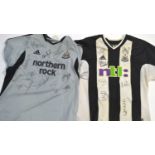 Two Newcastle United signed shirts,