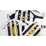 Three Newcastle United signed shirts,