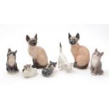 Seven Royal Copenhagen cat models