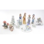 Seven Lladro porcelain groups and figures, together with four Rosenthal porcelain figures and groups