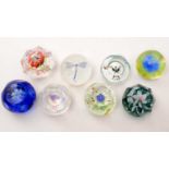 A collection of Caithness Glass paperweights,