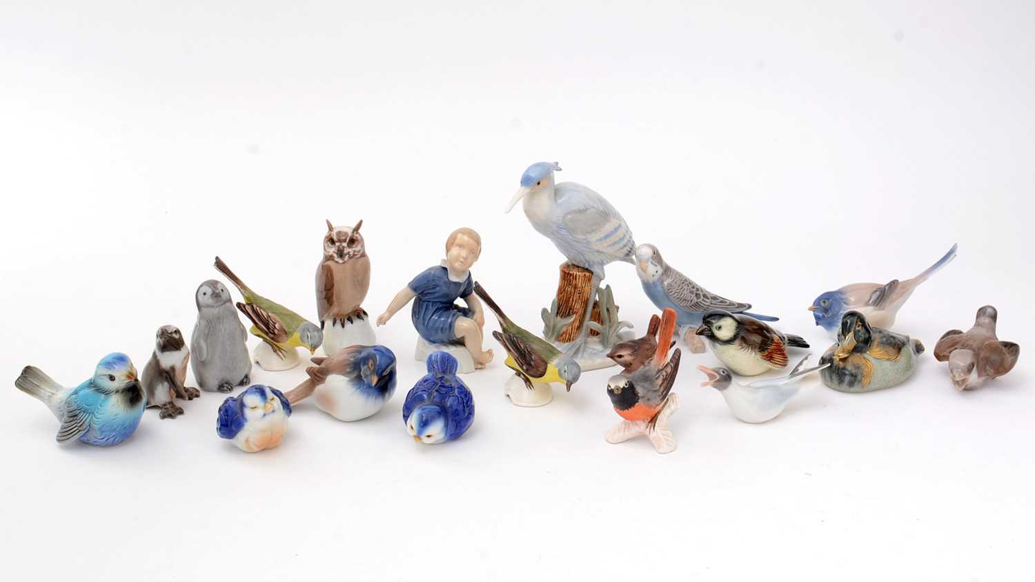 A collection of predominantly Bing and Grondahl porcelain figures of birds.