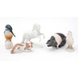 Various ceramic and porcelain figures of animals.