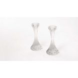 Baccarat, France: a pair of clear glass fluted candlesticks,