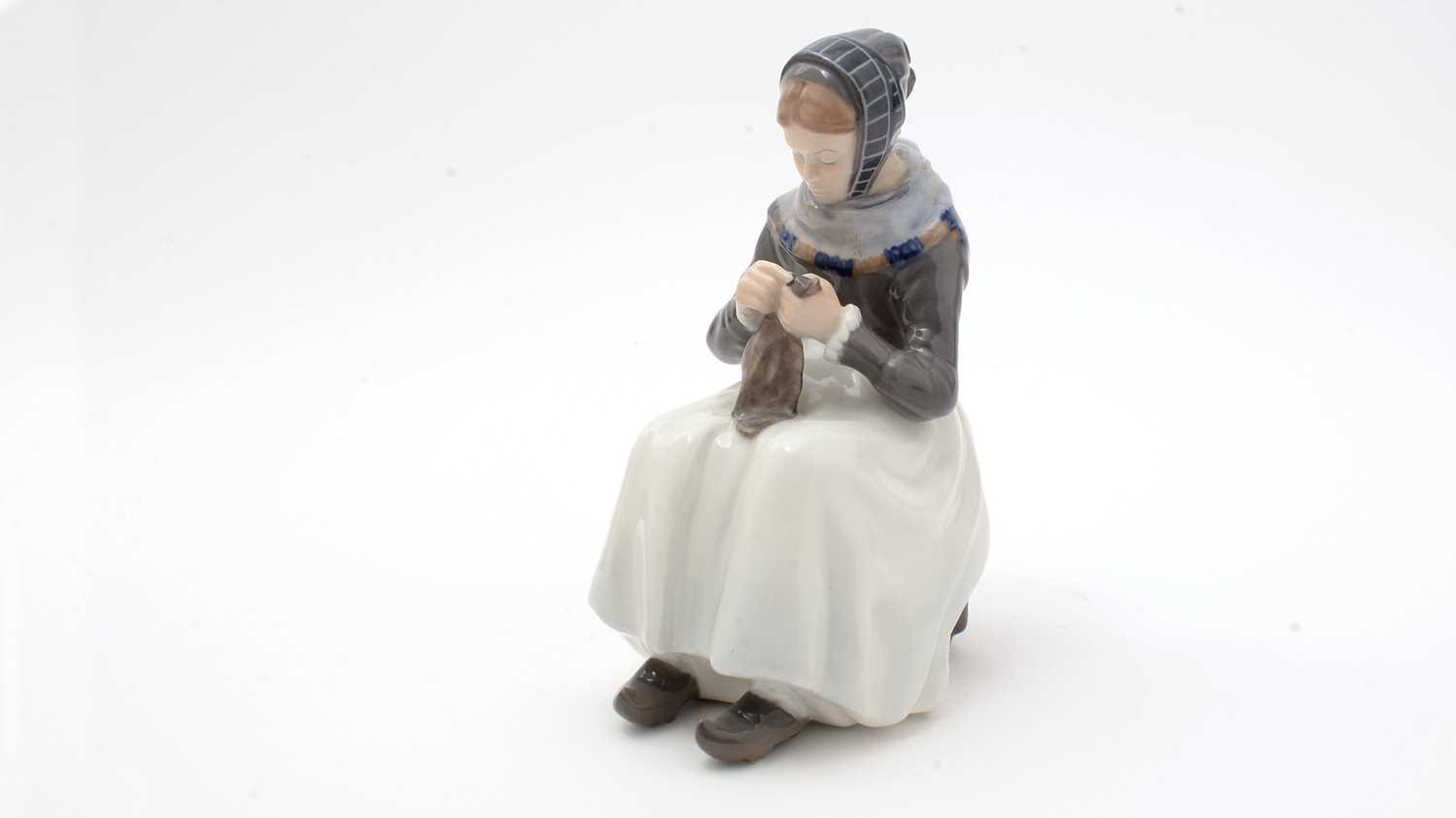 Royal Copenhagen figure Amager Girl Sewing