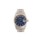 Rolex Oyster Perpetual Date: a steel-cased automatic wristwatch,
