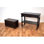 A Jacobean Revival oak coffer together with a 19th century ebonised hall table /