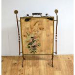 A Victorian mirrored firescreen.