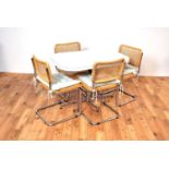 A retro style 20th Century kitchen table and chairs