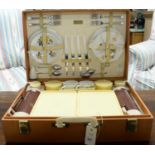 A vintage Brexton picnic trunk and contents