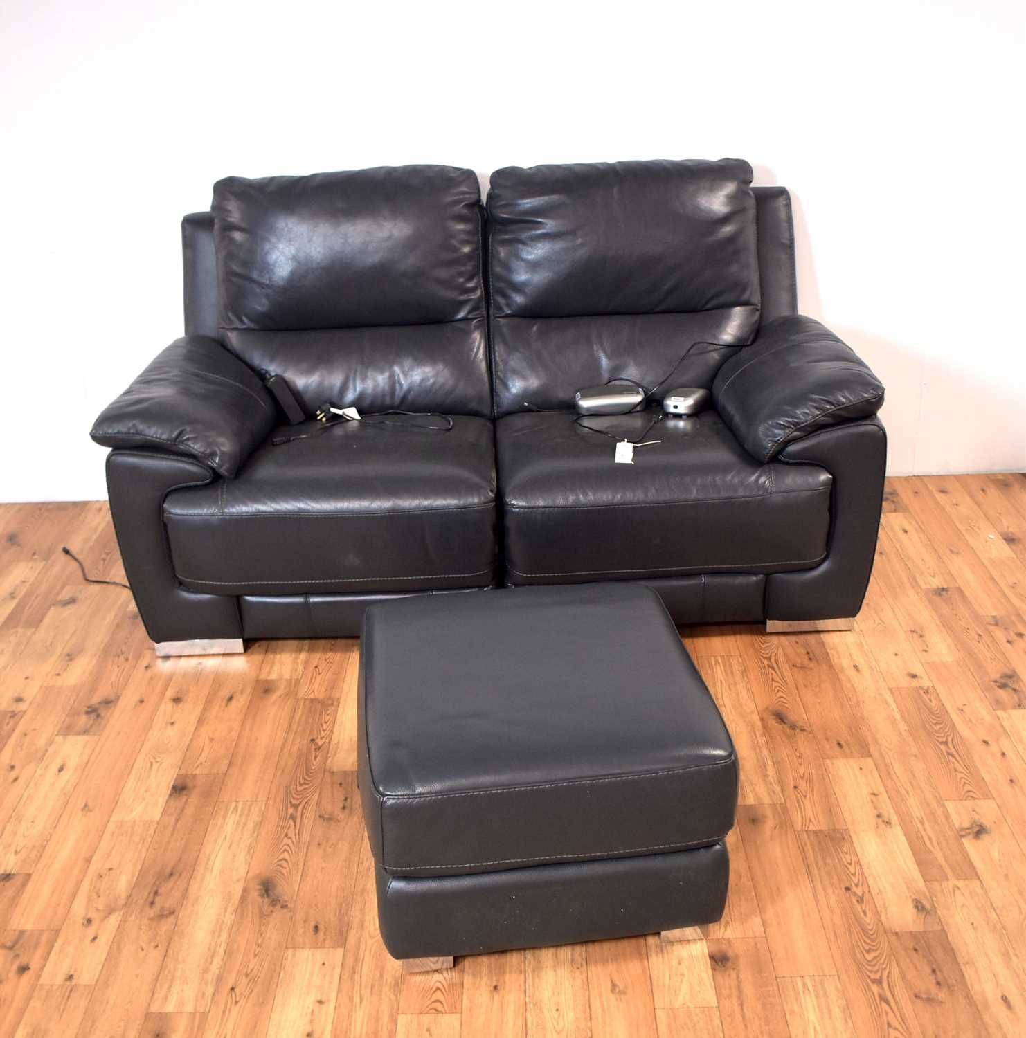 A pair of contemporary reclining lazy boy sofas