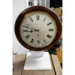 A late 19th/early 20th Century mahogany circular wall clock