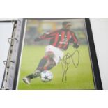 A collection of signed photographs of European footballers