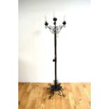 A 20th Century wrought iron lamp