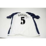 A Tottenham Hotspur FC football shirt autographed by Edgar Davids