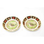 A pair of Royal Crown Derby ‘The 1998 Year Tray’ circular pin dishes