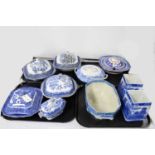 A collection of blue and white ‘Willow’ pattern ceramics