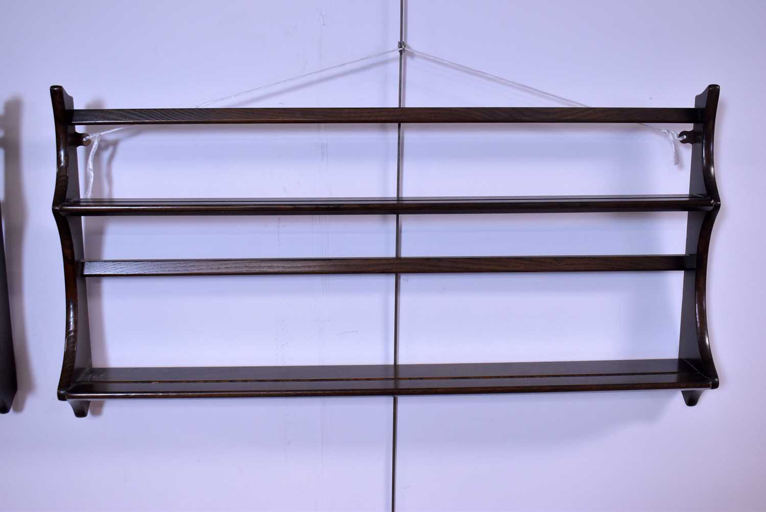 A retro vintage mid 20th Century Ercol elm two-tier plate rack; together with another plate rack - Image 2 of 4