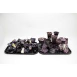 A collection of North Eastern purple malachite pressed glassware