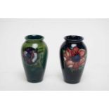 A Moorcroft ‘Anemone’ vase; together with a similar Moorcroft ‘Anemone’ vase
