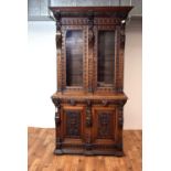 A 19th Century carved oak glazed bookcase