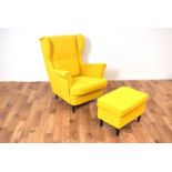A contemporary wingback armchair upholstered in vibrant yellow fabric with ottoman