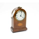 An early 20th Century inlaid and banded dome-cased mantel clock