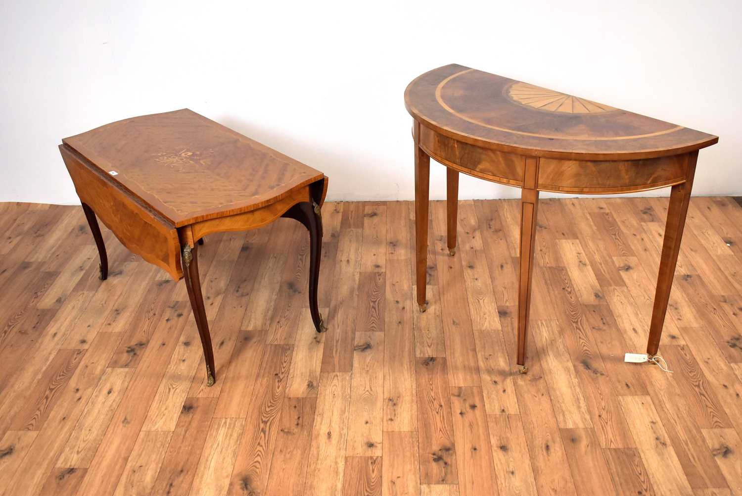 A Regency Revival demi lune inlaid mahogany hall table with a Regency Revival drop leaf table