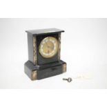 A Victorian marble and slate mantel clock