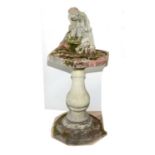 A composition hexagonal garden plinth with baluster stem, 73cm; and a composition putto ornament
