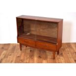 A retro vintage mid 20th Century teak wood bookcase