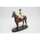 A Beswick Connoisseur model of Arkle with Pat Taaffe Up