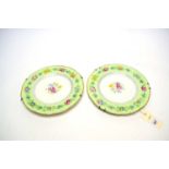A pair of Royal Worcester handpainted rose cabinet plates