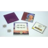 £100 Buckingham Palace coin and other crowns.