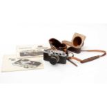 A Leica IIIa rangefinder camera; and accessories